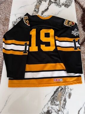 CCM Black and Gold Hockey Jersey with Number 19